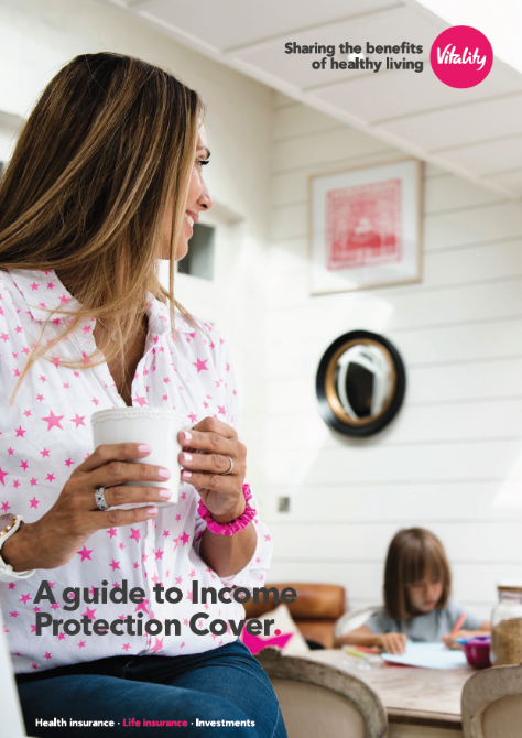 Brochure image of woman holding a mug in a kitchen