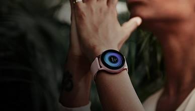 Decorative image of woman wearing a Samsung watch